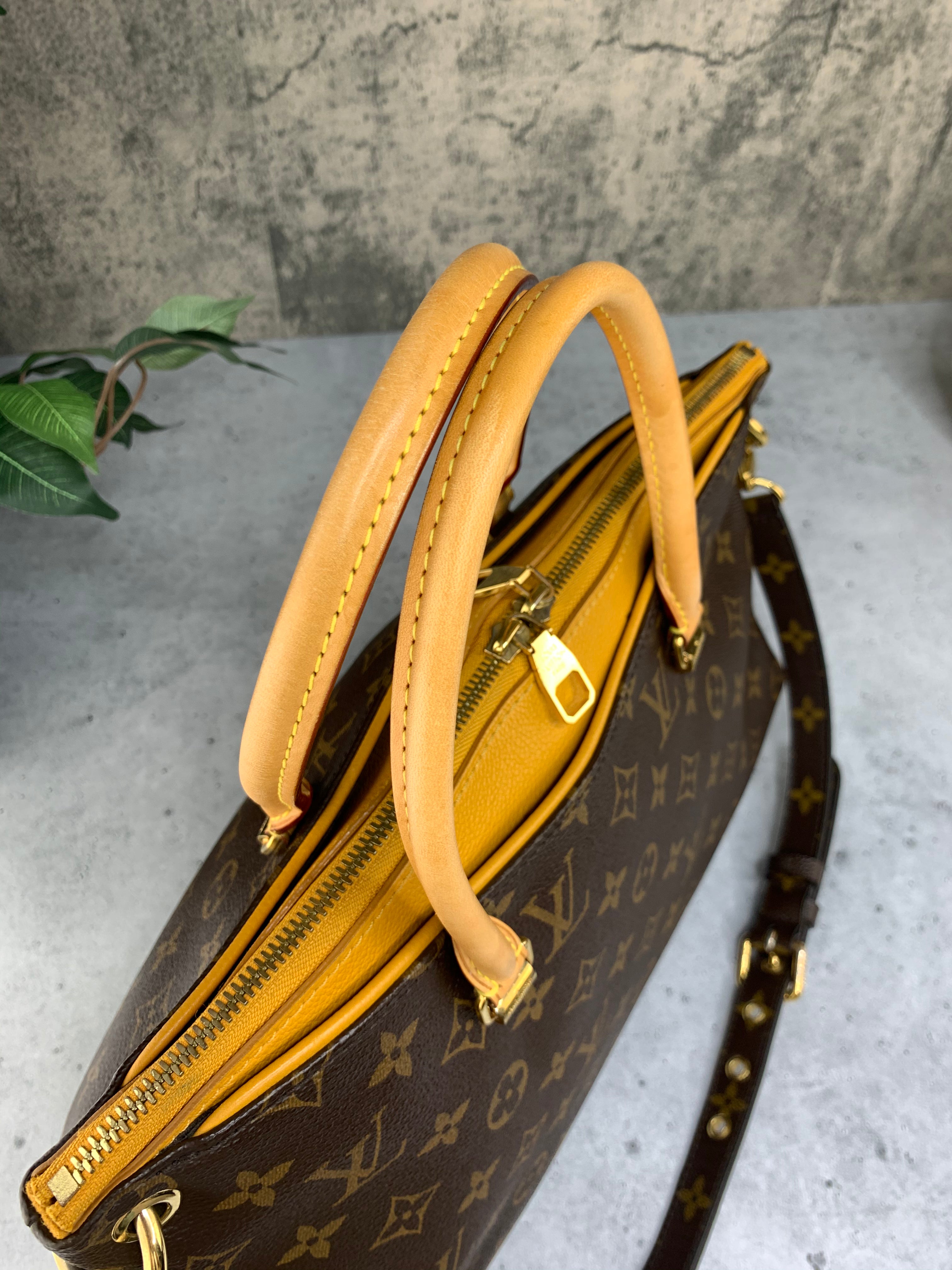 Louis Vuitton Saffron Pallas Bag