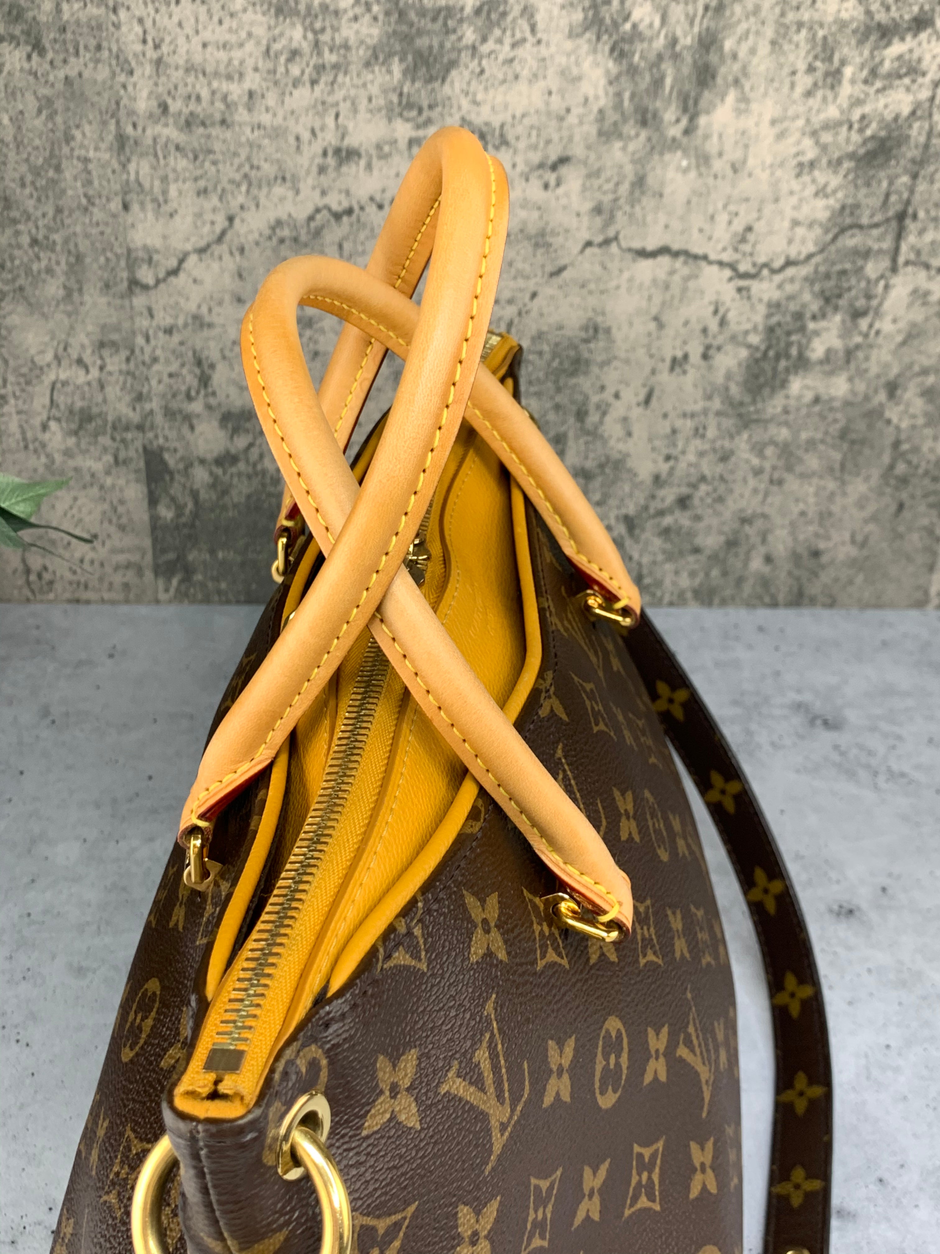 Louis Vuitton Saffron Pallas Bag