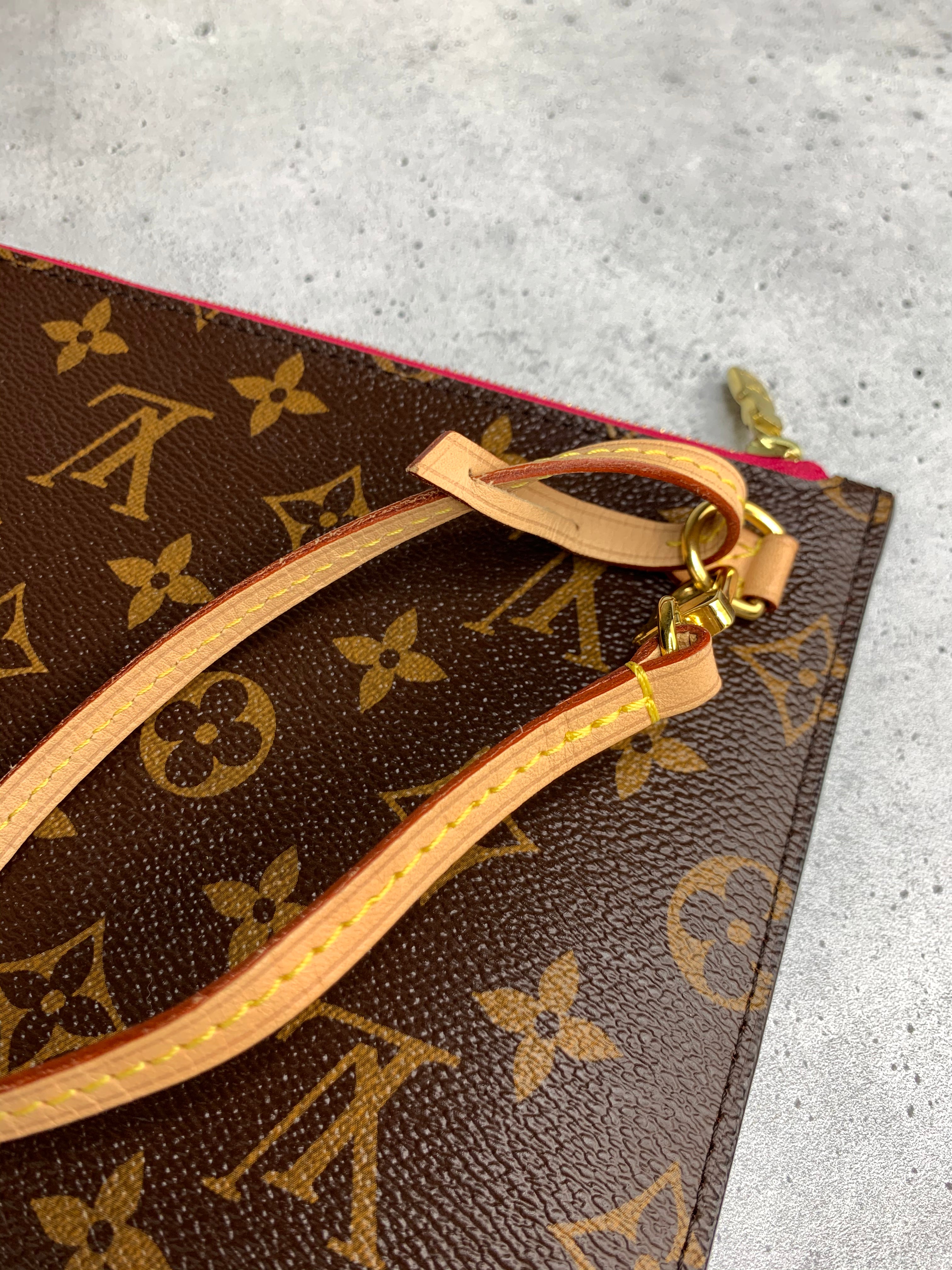 Louis vuitton 2025 neverfull clutch bag