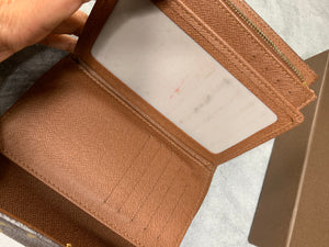 Alexandra leather wallet Louis Vuitton Brown in Leather - 32390063
