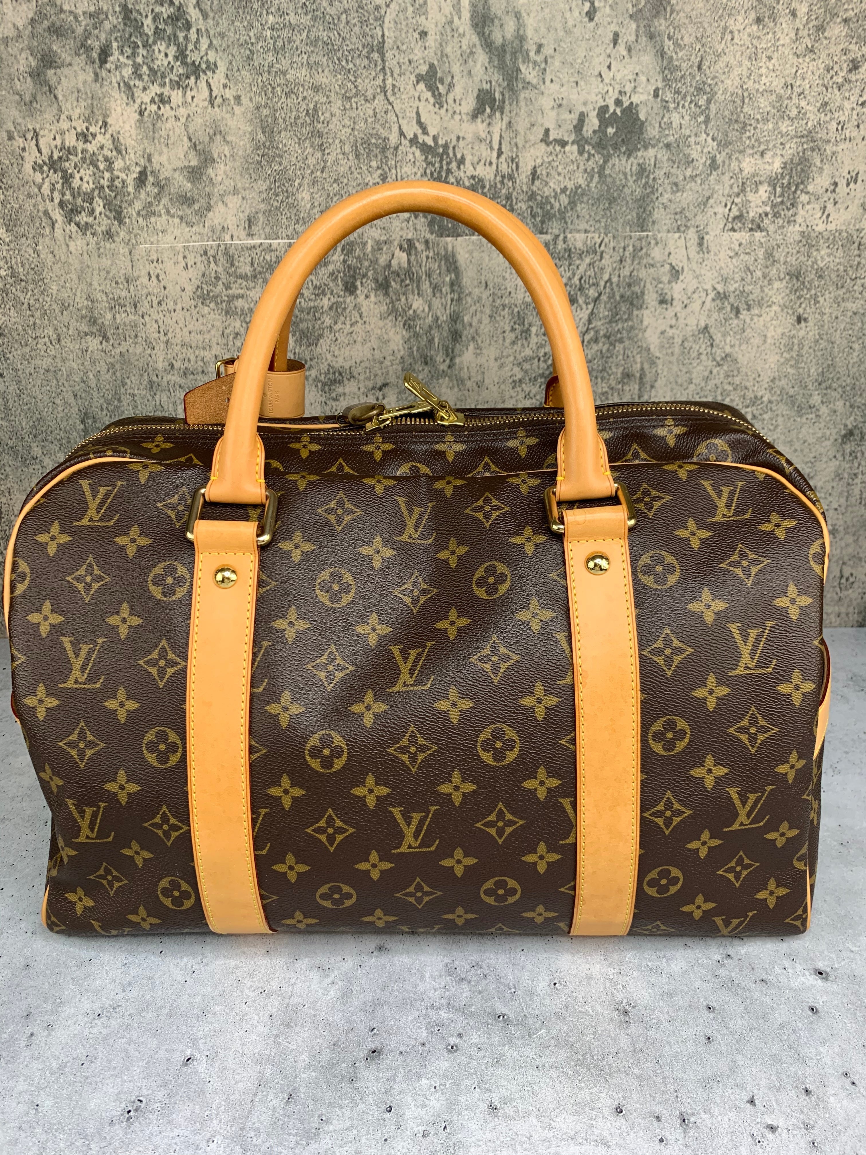 LOUIS VUITTON Monogram Carryall Travel Handbag