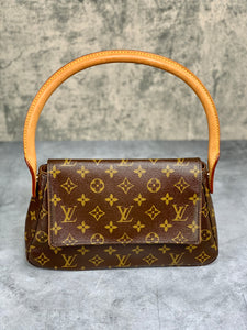 Louis Vuitton Classic Monogram Canvas Looping PM Bag. Very Good