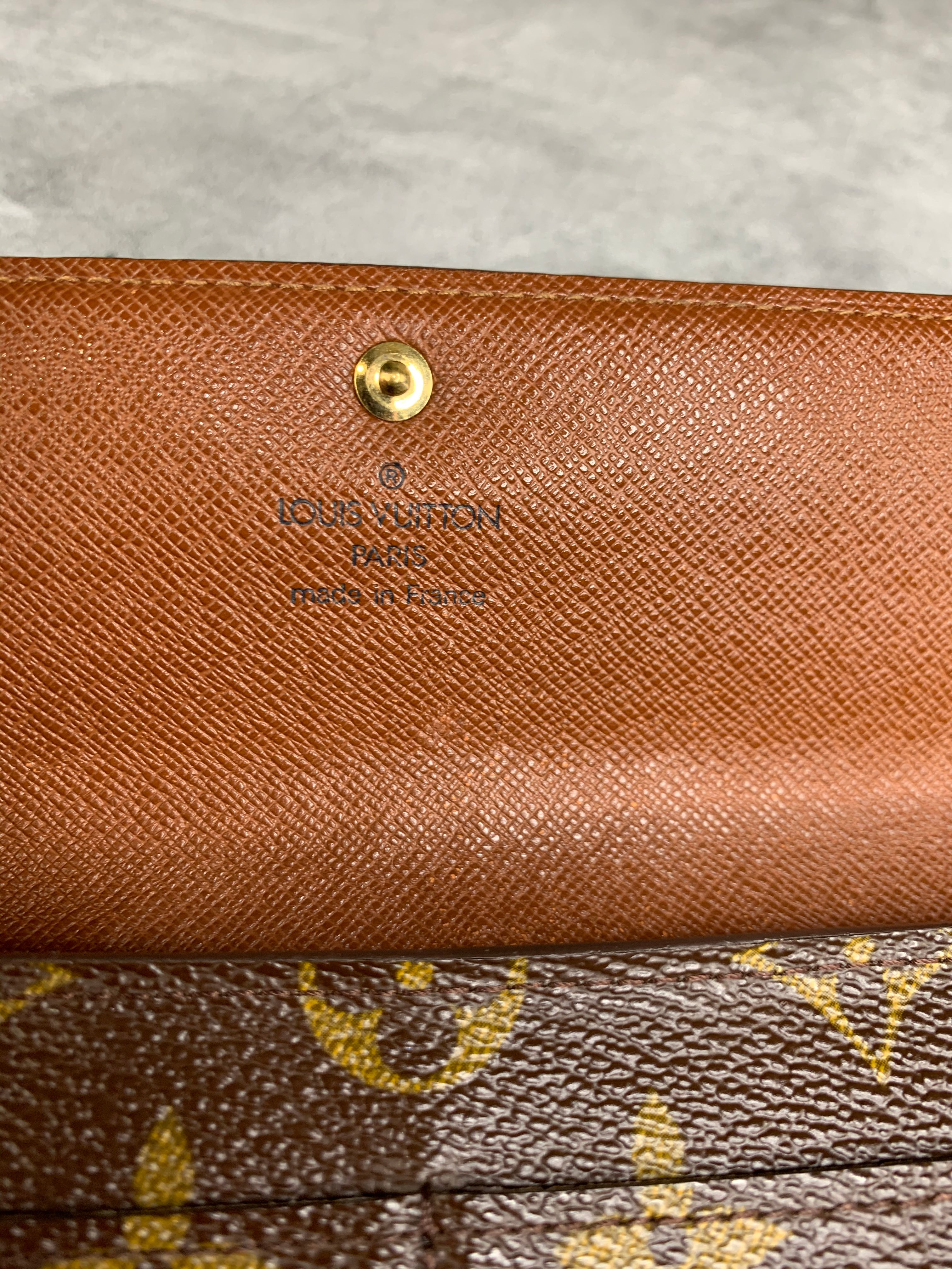 Louis Vuitton Cream Suhali Leather International Trifold Sarah