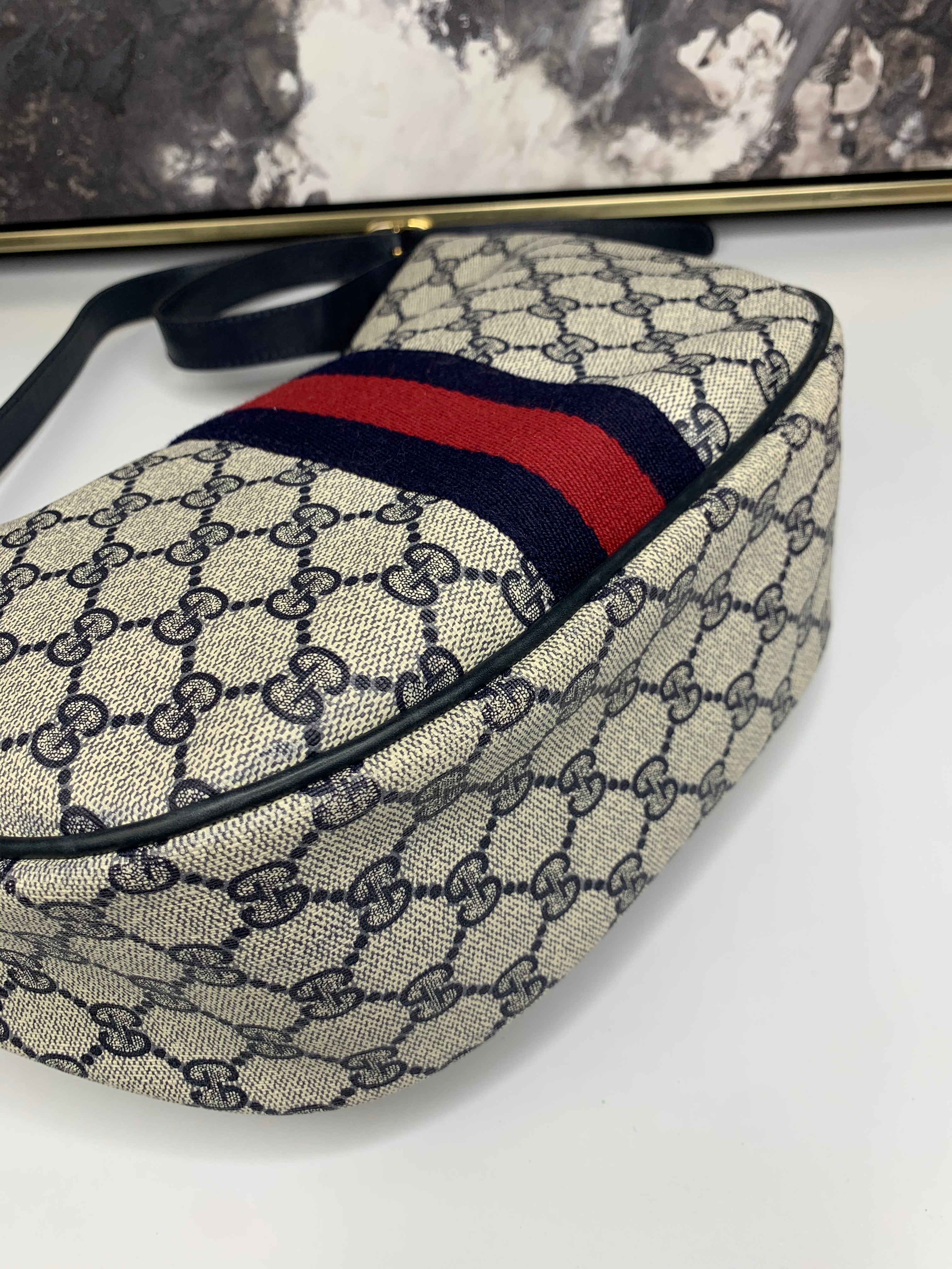 Gucci half sales moon sling bag